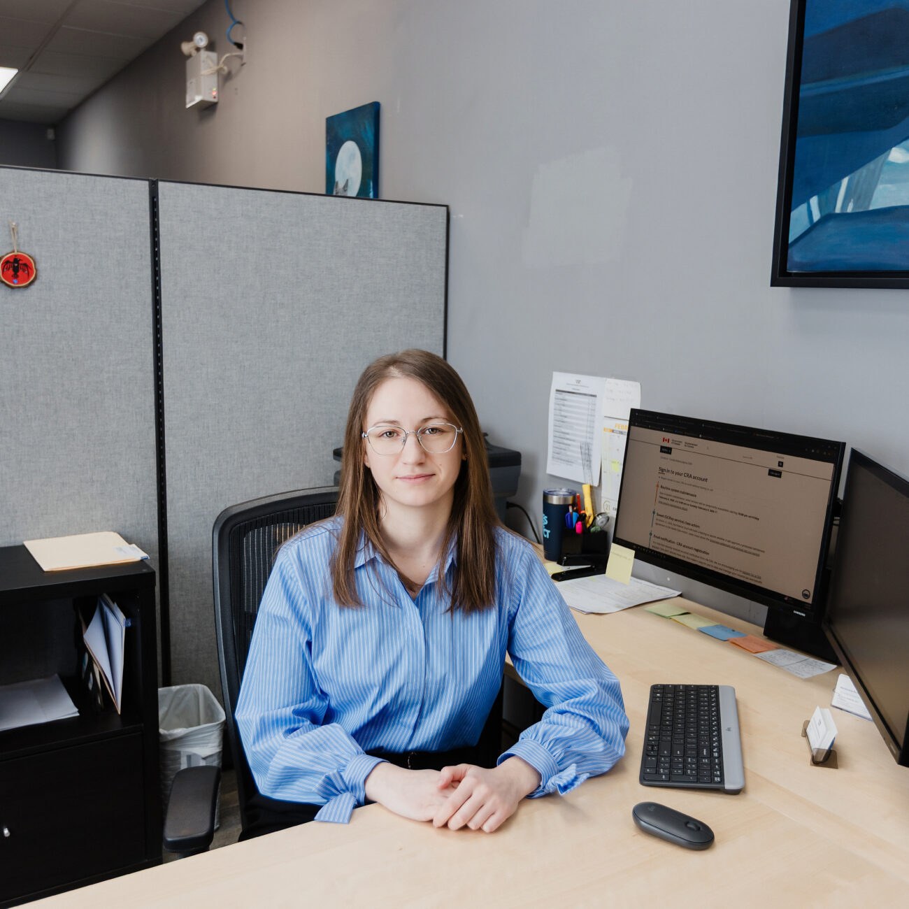 A Warkentin advisor at her desk in the Winnipeg office